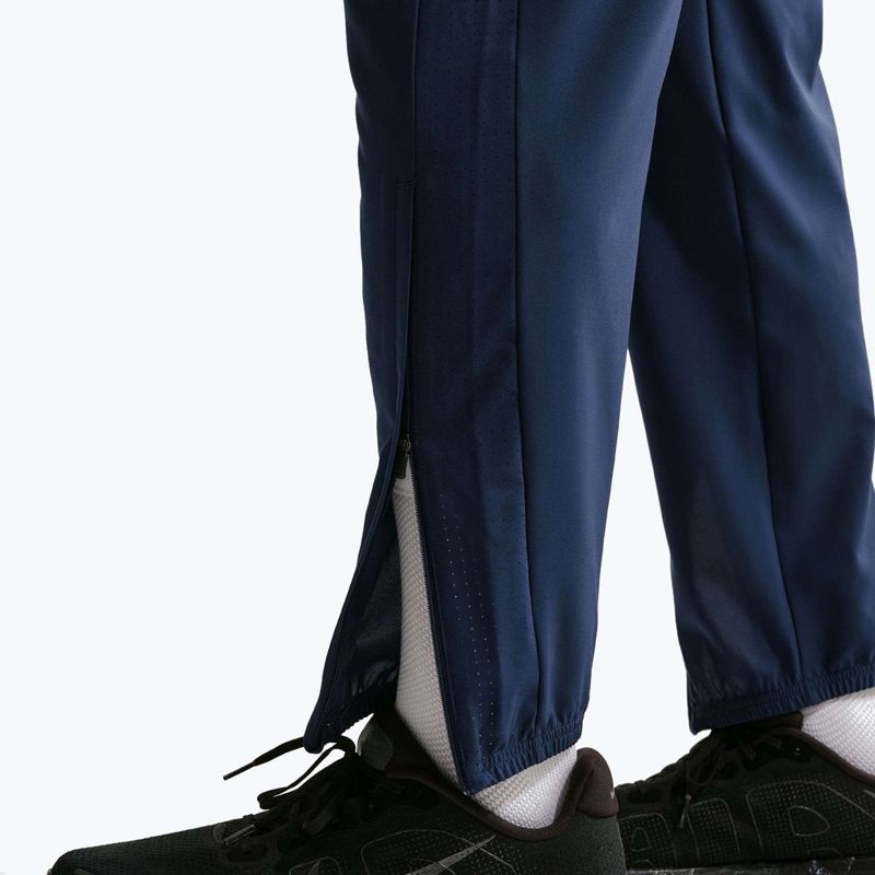 Pánske bežecké nohavice Nike Miler Dri-Fit Woven midnight navy 7