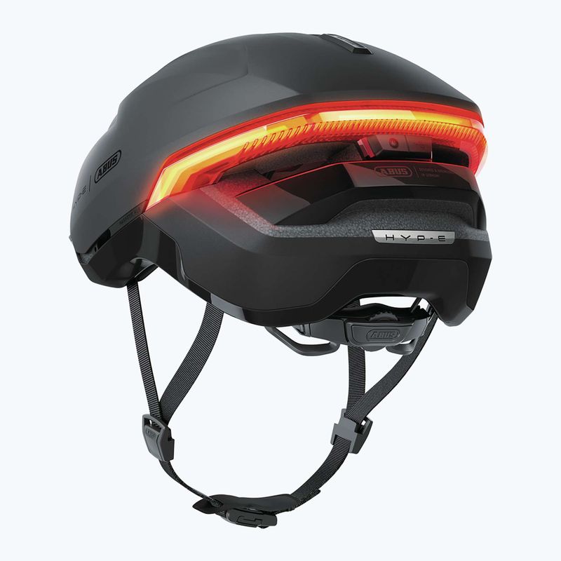 Cyklistická prilba s ukazovateľmi smeru ABUS Hyp-E volcano titan 4